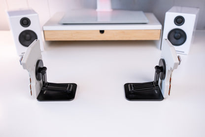 Mantaray Pro Wireless on two tenting stands angled vertically on a desk.